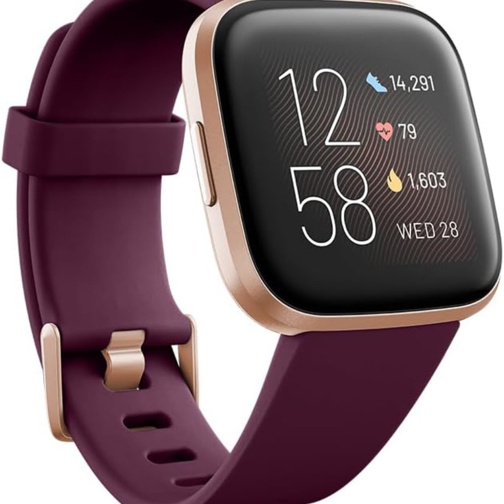 Fitbit Versa 2 in Rose Gold with accessories